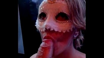 Masked MILF gives a blowjob