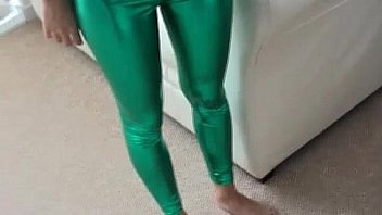 Sasha teasing in shiny green PVC panties