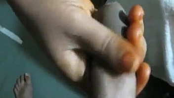 Desi Indian wife holding and shaking dick of her hubby while she feels hot