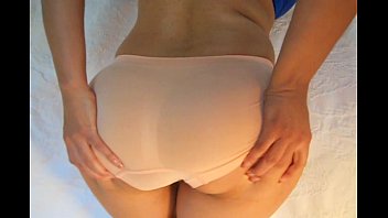 Panties tease peach